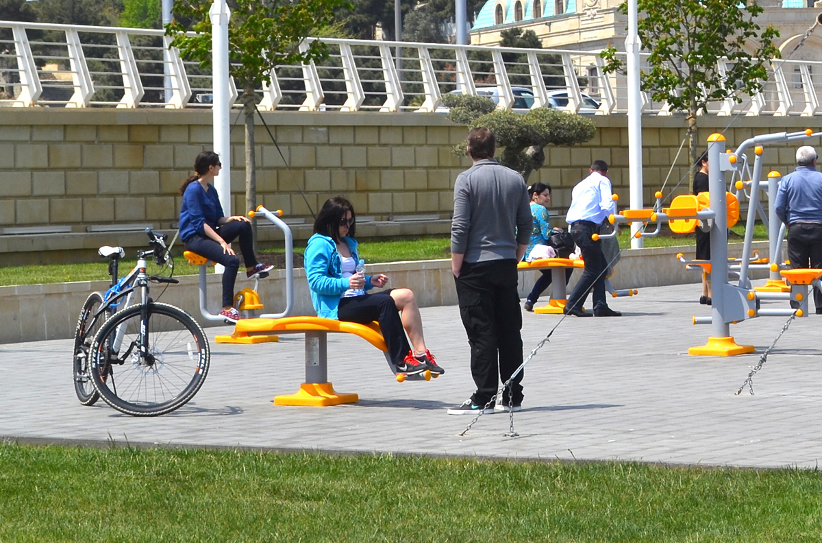 Youth pushing pedals on Baku Boulevard on eve of European Games