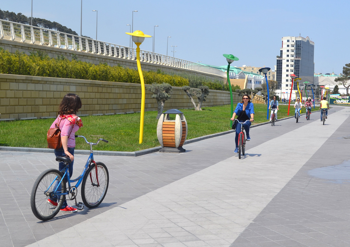 Youth pushing pedals on Baku Boulevard on eve of European Games