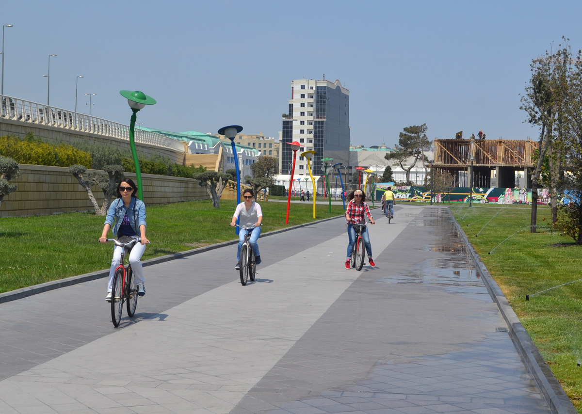 Youth pushing pedals on Baku Boulevard on eve of European Games