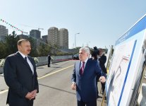 Ilham Aliyev attends opening of bridge and road in Baku (PHOTO)