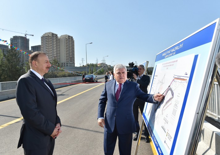 Ilham Aliyev attends opening of bridge and road in Baku (PHOTO)