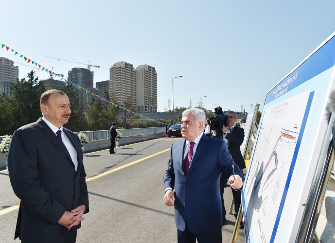 Ilham Aliyev attends opening of bridge and road in Baku (PHOTO)