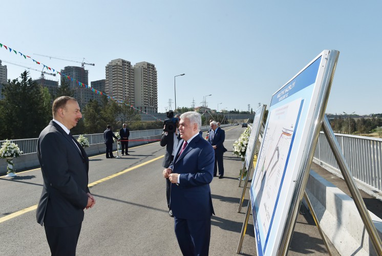 Ilham Aliyev attends opening of bridge and road in Baku (PHOTO)
