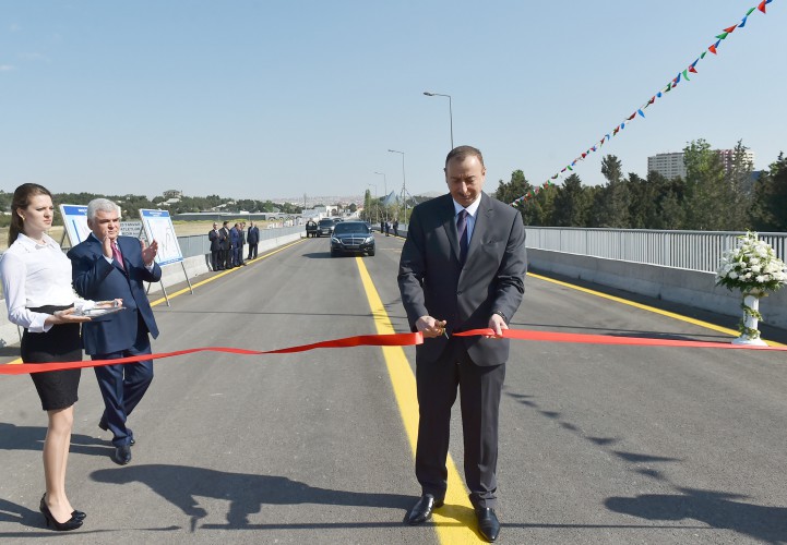 Ilham Aliyev attends opening of bridge and road in Baku (PHOTO)