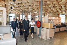 President Ilham Aliyev, his spouse review “Atelye 61” restaurant in National Flag Square