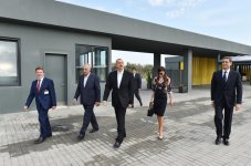 Azerbaijani president, his spouse attend opening of school complex and Golf Club