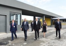 Azerbaijani president, his spouse attend opening of school complex and Golf Club