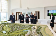 Azerbaijani president, his spouse attend opening of school complex and Golf Club