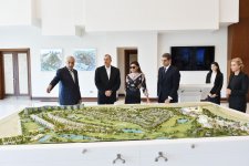 Azerbaijani president, his spouse attend opening of school complex and Golf Club