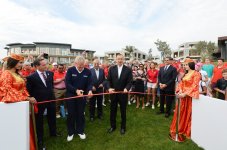 Azerbaijani president, his spouse attend opening of school complex and Golf Club