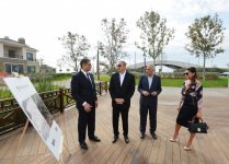 Azerbaijani president, his spouse attend opening of school complex and Golf Club