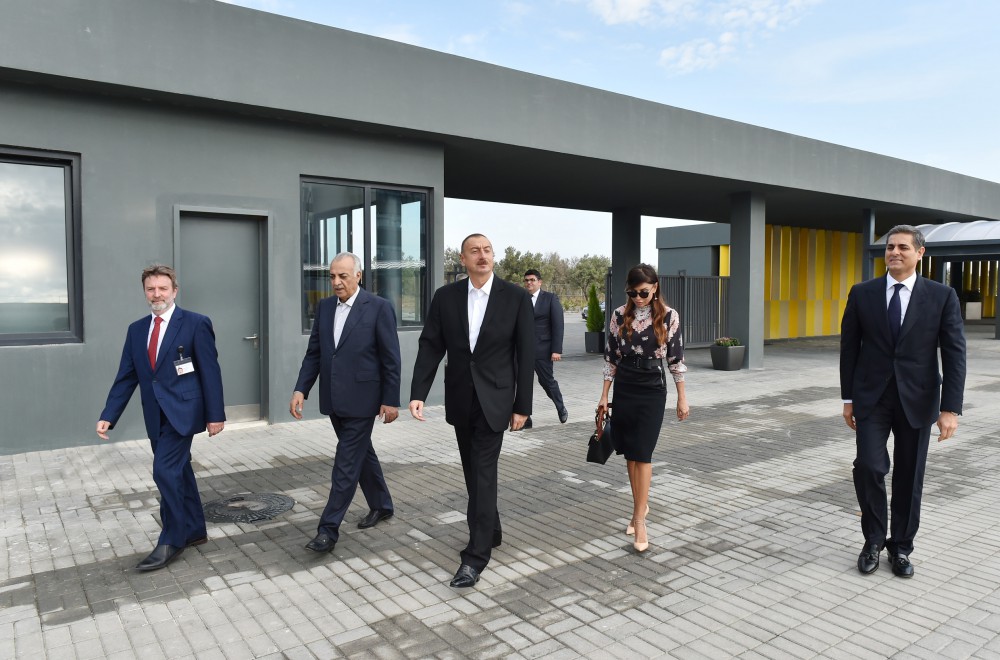 Azerbaijani president, his spouse attend opening of school complex and Golf Club