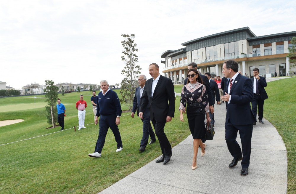Azerbaijani president, his spouse attend opening of school complex and Golf Club