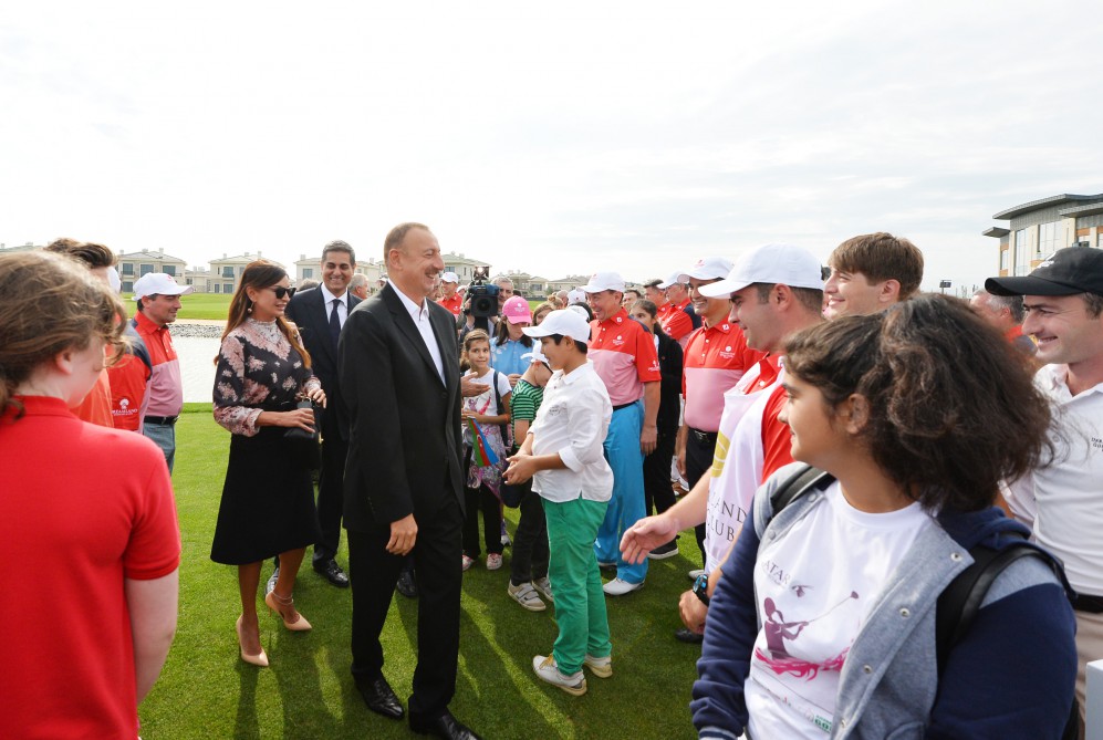 Azerbaijani president, his spouse attend opening of school complex and Golf Club