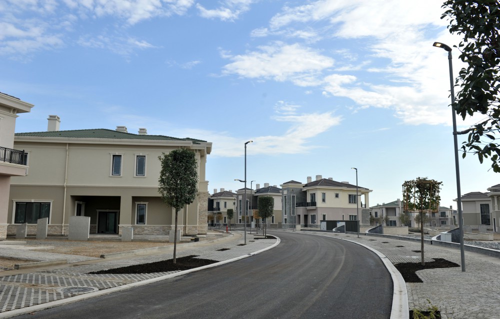 Azerbaijani president, his spouse attend opening of school complex and Golf Club