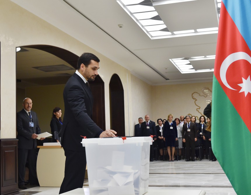 Azerbaijani president, his spouse vote at parliamentary election