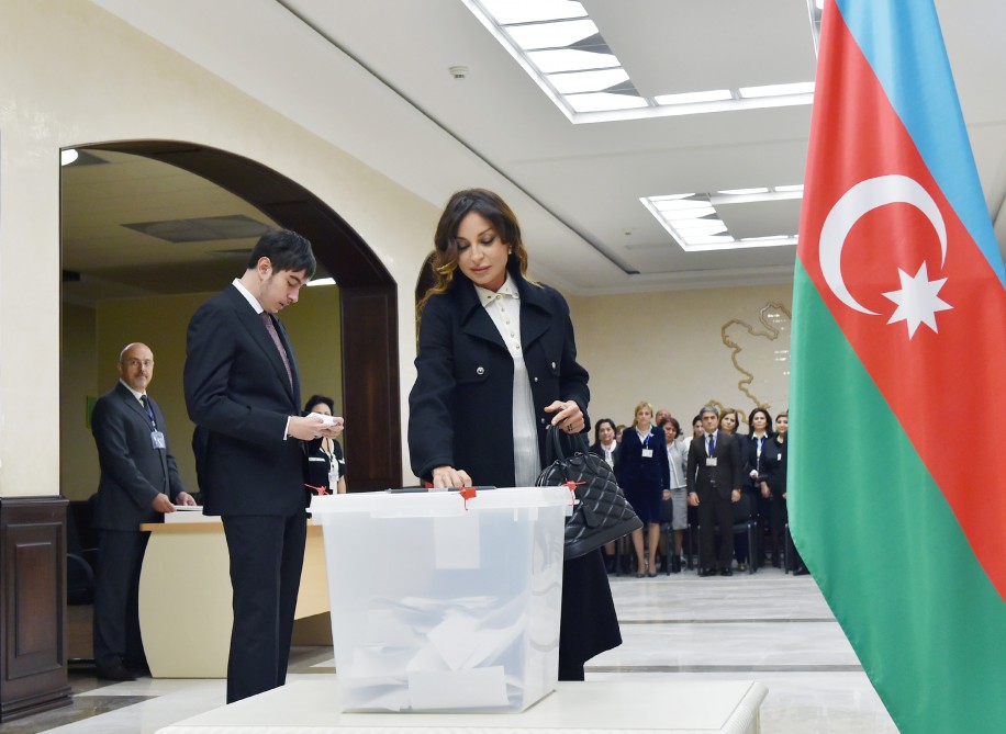 Azerbaijani president, his spouse vote at parliamentary election