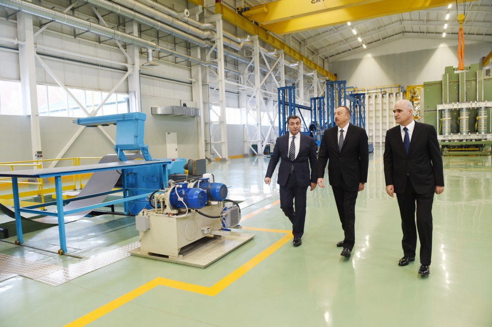 President Aliyev attends opening of large-size transformer plant, lays foundation stone for new enterprise (PHOTO)