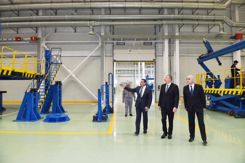 President Aliyev attends opening of large-size transformer plant, lays foundation stone for new enterprise (PHOTO)