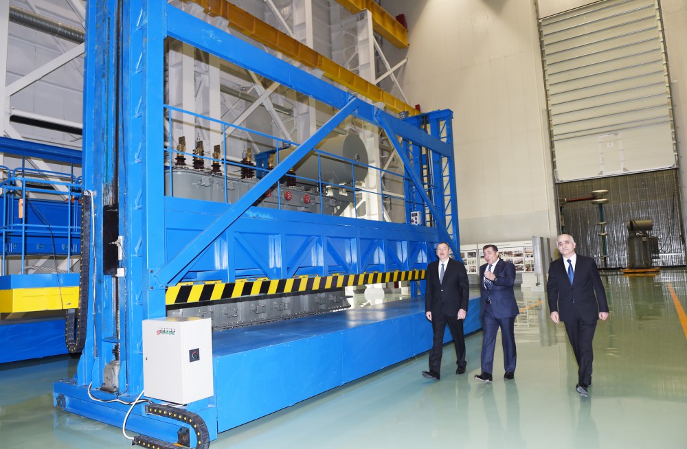 President Aliyev attends opening of large-size transformer plant, lays foundation stone for new enterprise (PHOTO)