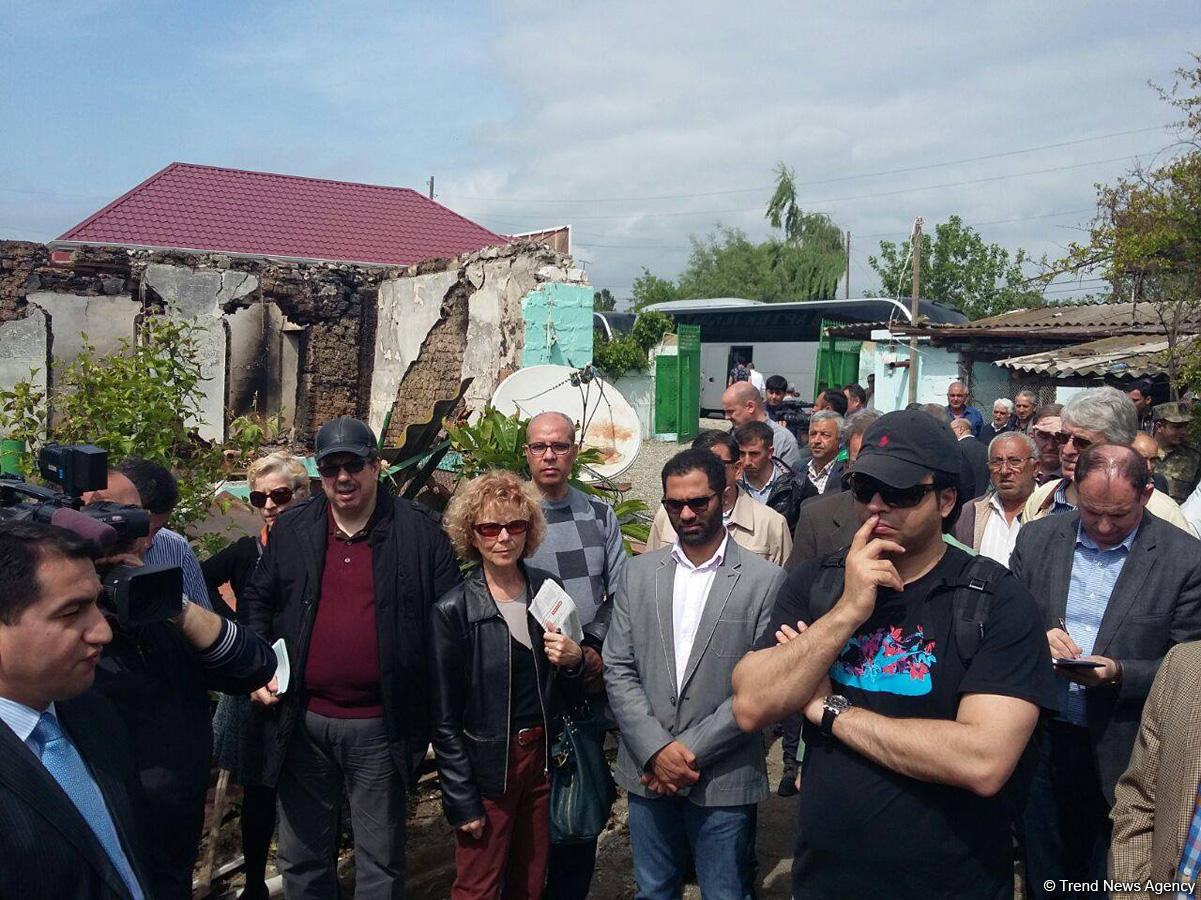 Diplomats visit Azerbaijan’s Aghdam, view houses shelled by Armenians