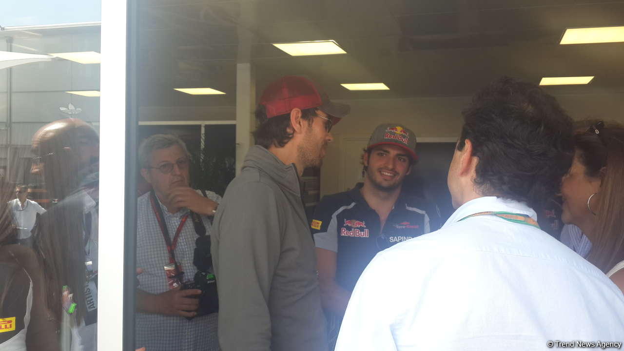 Enrique Iglesias visits pit boxes of teams participating in F1 Grand Prix of Europe in Baku