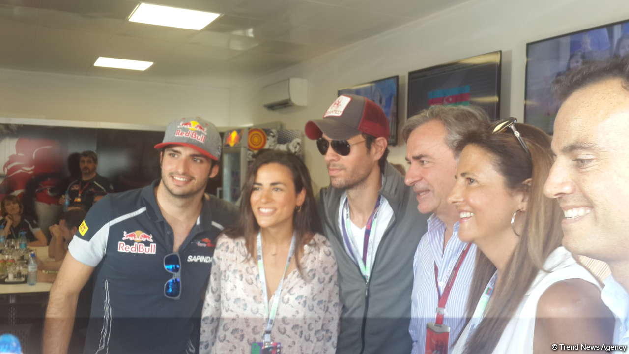 Enrique Iglesias visits pit boxes of teams participating in F1 Grand Prix of Europe in Baku