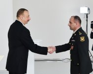 President Aliyev views residential building for servicemen