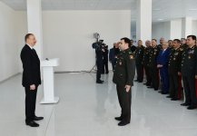 President Aliyev views residential building for servicemen