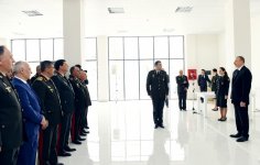 President Aliyev views residential building for servicemen