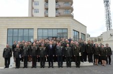President Aliyev views residential building for servicemen