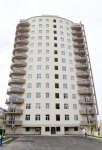 President Aliyev views residential building for servicemen