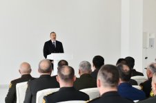 President Aliyev views residential building for servicemen