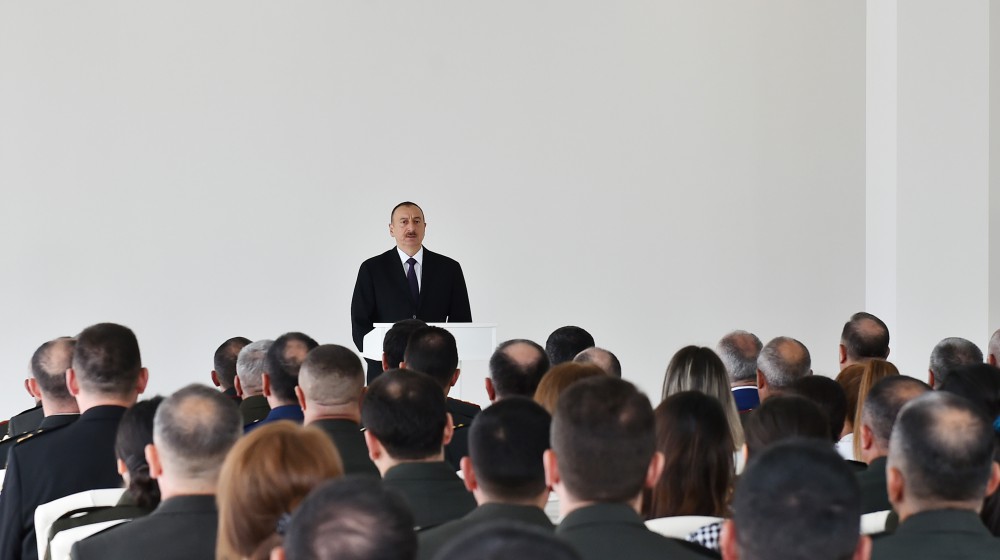 President Aliyev views residential building for servicemen