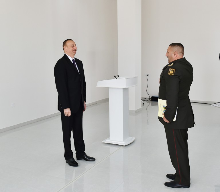 President Aliyev views residential building for servicemen