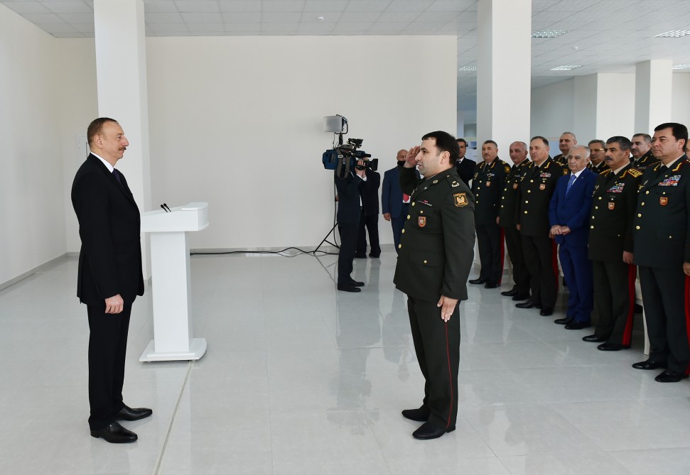 President Aliyev views residential building for servicemen