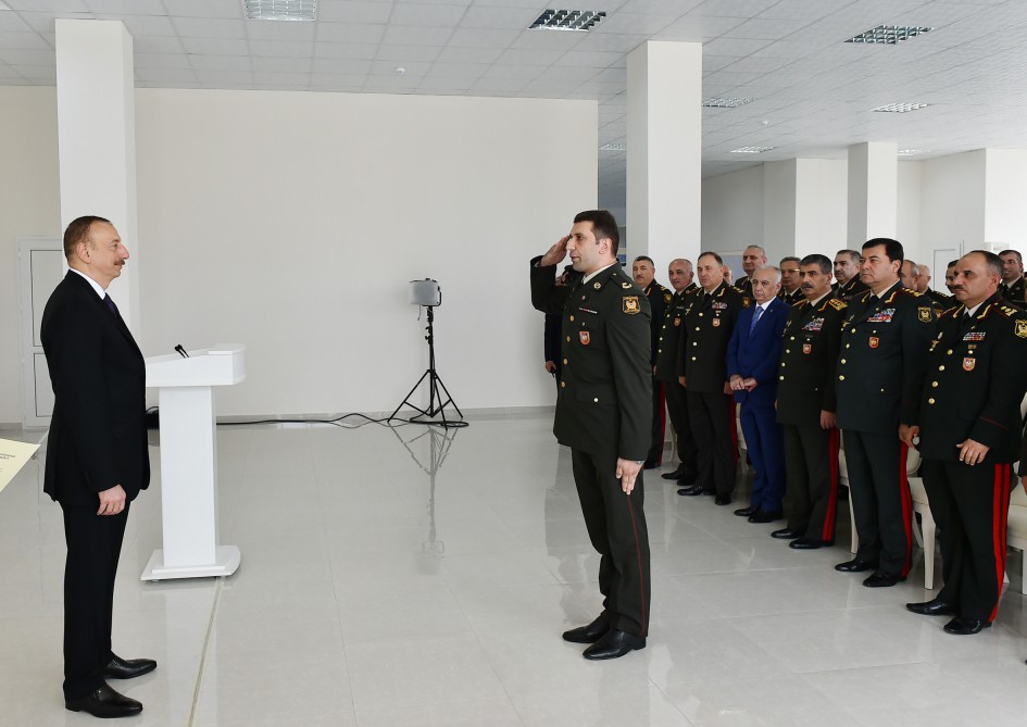 President Aliyev views residential building for servicemen