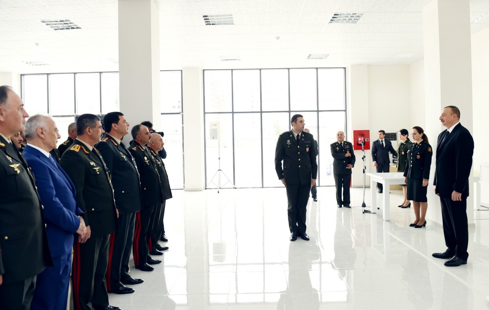 President Aliyev views residential building for servicemen
