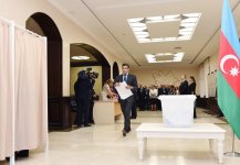 Ilham Aliyev, his spouse vote at constitutional referendum