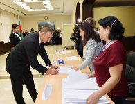 Ilham Aliyev, his spouse vote at constitutional referendum