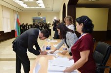 Ilham Aliyev, his spouse vote at constitutional referendum