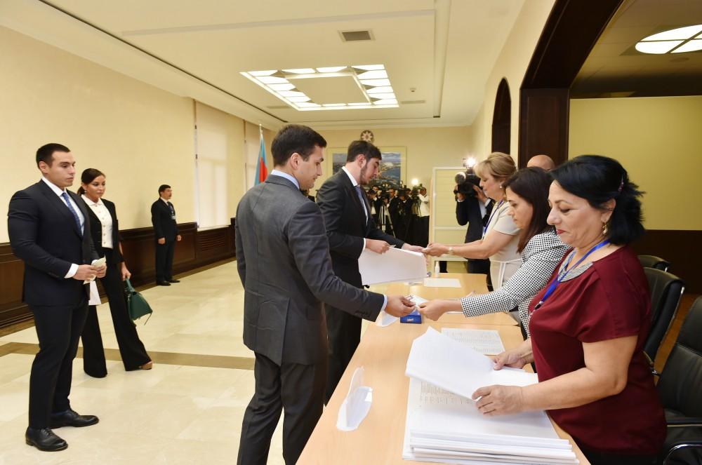 Ilham Aliyev, his spouse vote at constitutional referendum
