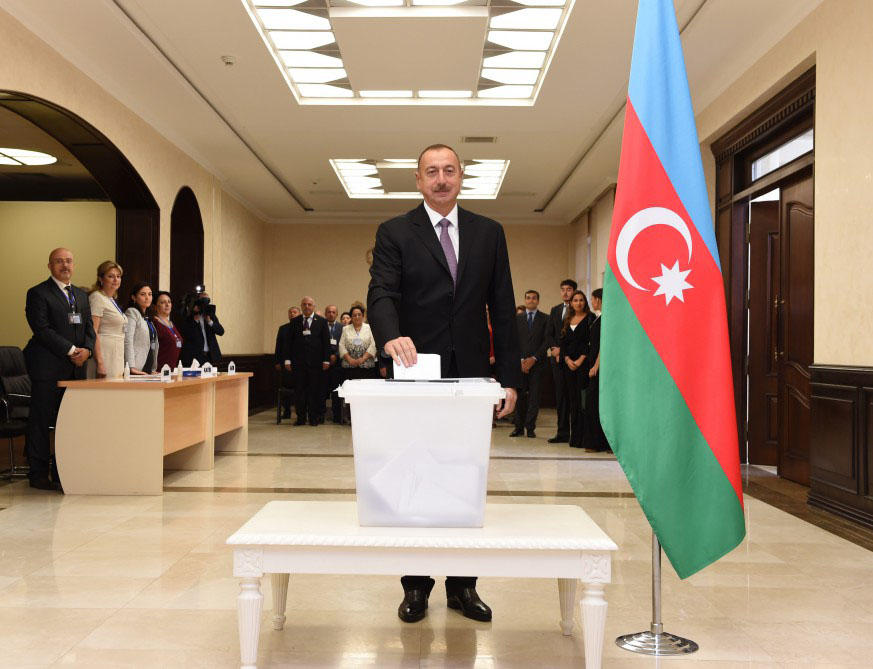 Ilham Aliyev, his spouse vote at constitutional referendum