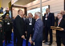 Ilham Aliyev views ADEX 2016 exhibition  (PHOTO)