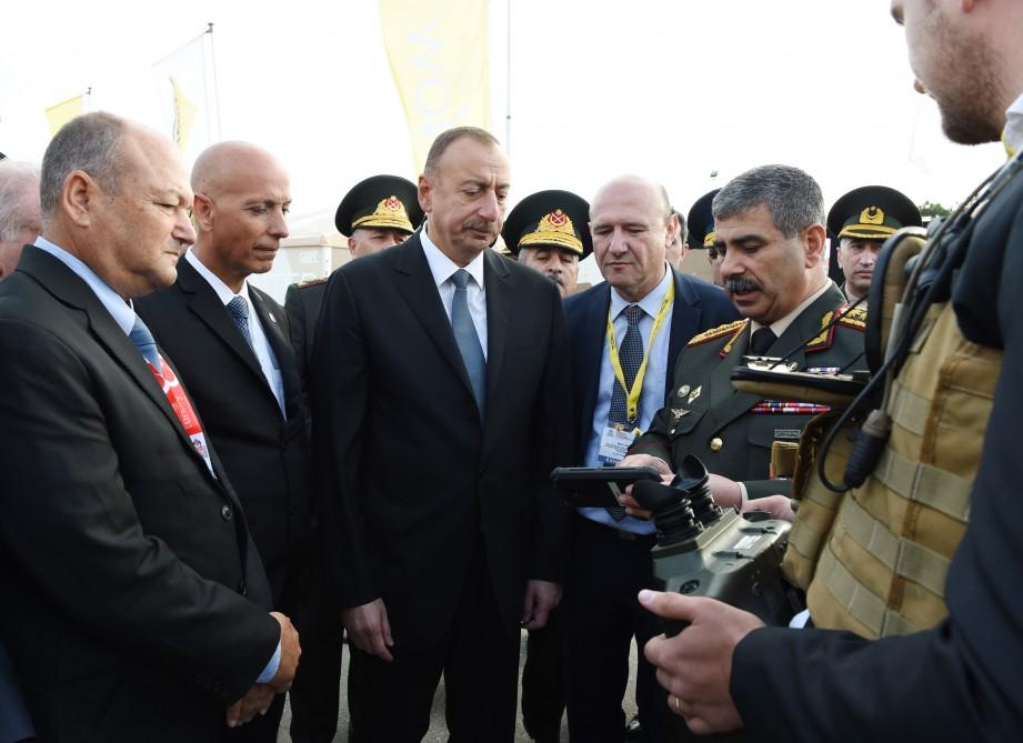 Ilham Aliyev views ADEX 2016 exhibition  (PHOTO)