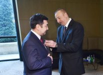 President Ilham Aliyev awards  “Dostlug” Order to President of Int'l Turkish Academy (PHOTO)