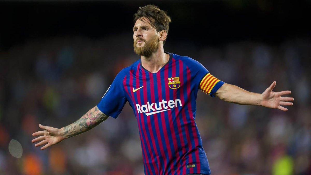 Messi scores 400th league goal to help Barca reach halfway point