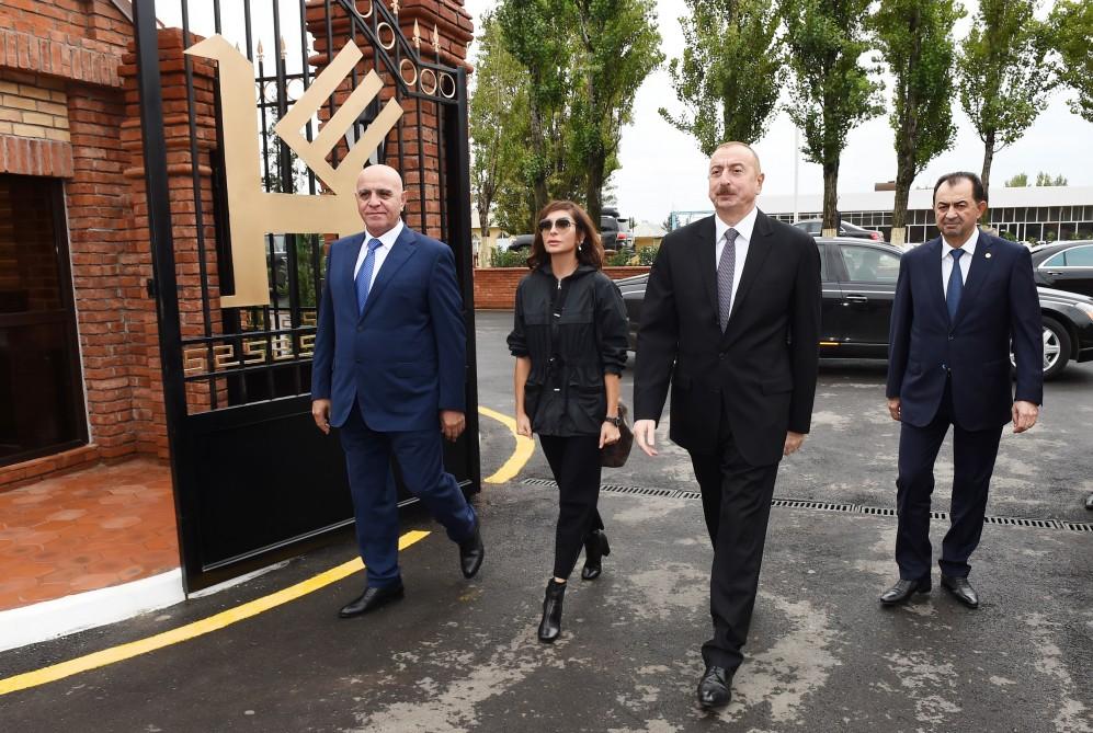 Azerbaijani president, first lady attend opening of Lankaran branch of Azerkhalcha (PHOTO)