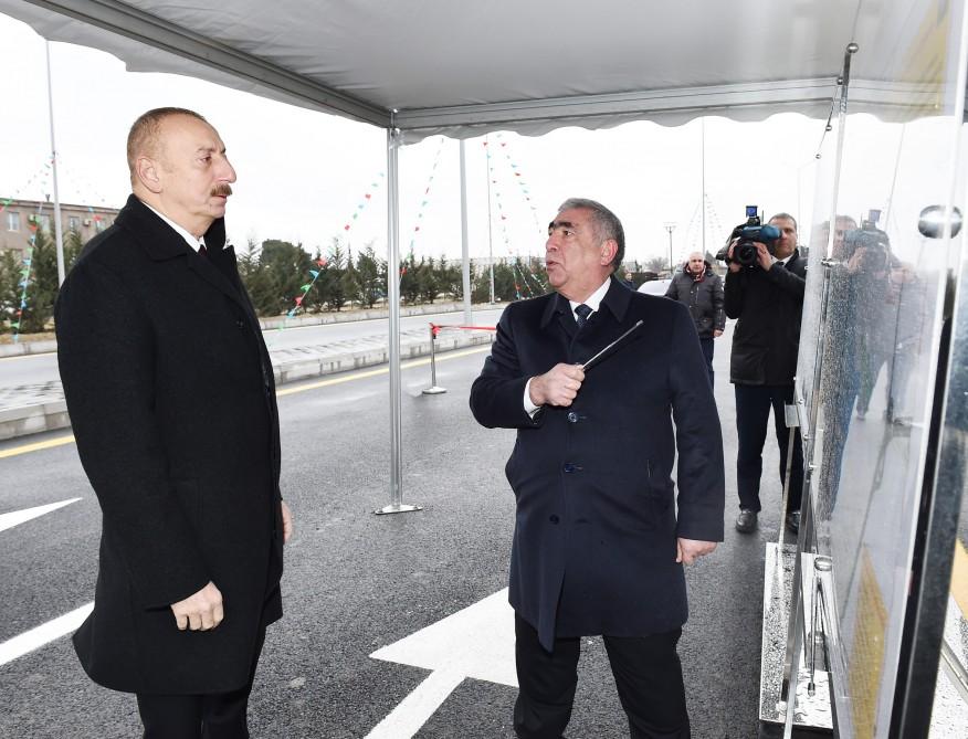 Azerbaijani president attends opening of road connecting Ziya Bunyadov avenue with Balakhani-Binagadi highway (PHOTO)