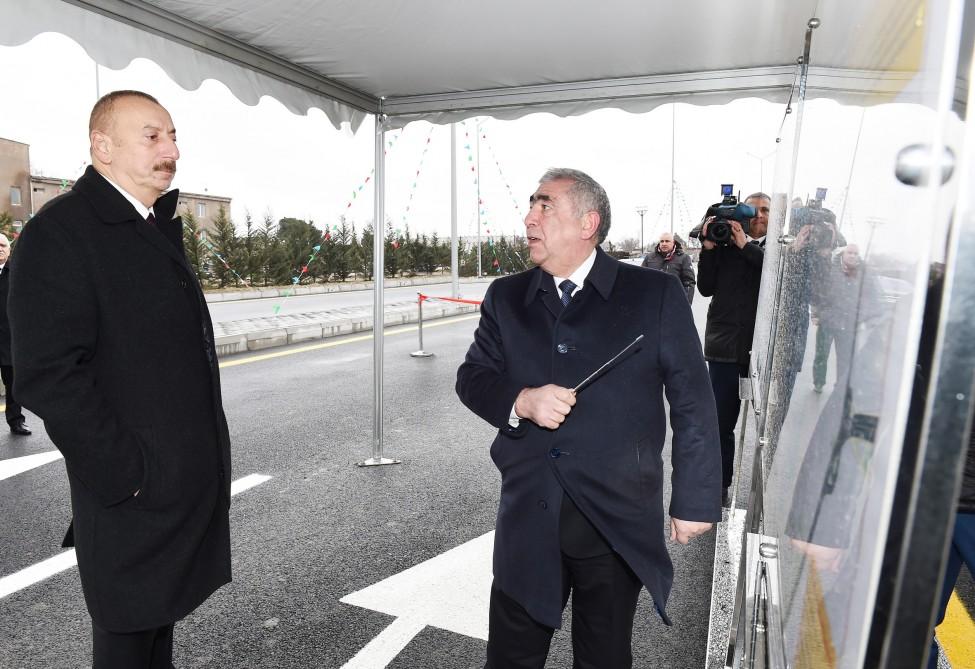 Azerbaijani president attends opening of road connecting Ziya Bunyadov avenue with Balakhani-Binagadi highway (PHOTO)